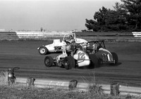 Gary #12 "shakes hands" with Pancho Carter #21 with Johnny Parsons Terre Haute 11-2-80