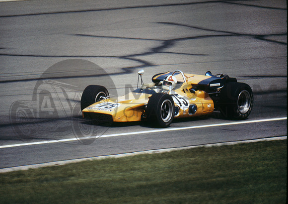 Denny Hulme  (magenta hue on photo edges)