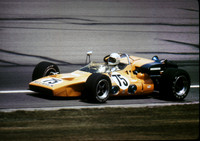 Bobby Unser tests #75 after Hulme's fire (magenta hue on photo edges)