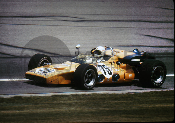 Bobby Unser tests #75 after Hulme's fire (magenta hue on photo edges)
